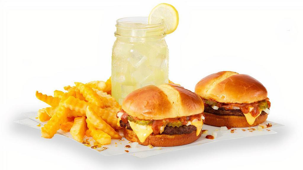 2 Cheeseburgers Combo · Not just one cheeseburger, but two! Both cheeseburgers have a juicy beef patty piled up with onions, pickles, a slice of American cheese and Jack's secret sauce on a toasted premium artisan bun. Served with fries and a regular drink.