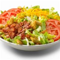 Blt Salad · All the delicious tastes of a BLT, without the bread. Lettuce, sliced tomatoes, shredded che...