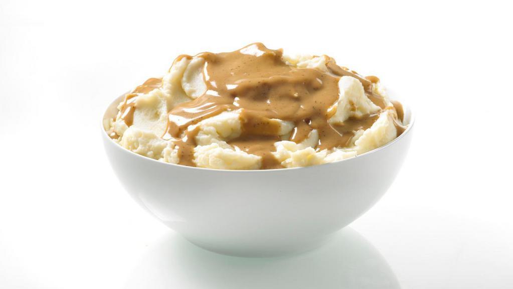 Mashed Potatoes With Gravy · Light, buttery, and creamy Southern-style mashed potatoes with gravy.