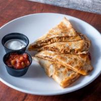 Chicken Quesadilla · Grilled flour tortilla, fajita spiced chicken, caramelized onions, red peppers, cheese, sour...