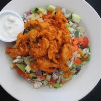 Buffalo Chicken Salad · Crispy buffalo chicken breast, crumbled blue cheese, vine-ripened tomato, cucumber, celery, ...