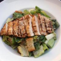 Grilled Chicken Caesar Salad · Grilled chicken breast, baby romaine hearts, aged parmesan, ciabatta croutons, classic Caesa...