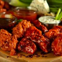 Boneless Wings  (10 Pcs) · Hand-breaded tossed in choice of sauce.