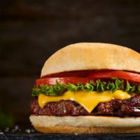 The Original Duffy'S Cheeseburger · ½ lb. beef patty, vine-ripened tomato, hand-leafed lettuce, onion, sharp cheddar cheese, Duf...