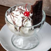 Warm Brownie Sundae · Warm chocolate brownie, vanilla ice cream, Ghirardelli chocolate sauce, whipped cream and a ...
