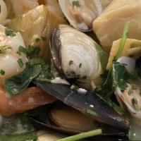 Seafood Pasta · Shrimps, clams, mussels, spinach, and artichoke served over your choice of marinara sauce or...