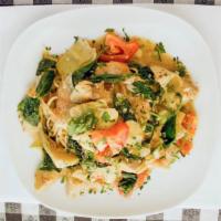 Grouper Alla Eva · Sautéed grouper fillet, along with spinach, fresh tomatoes, and artichoke hearts, in a lemon...