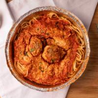 Spaghetti & Meatballs · Spaghetti topped with homemade meatballs and tomato sauce.