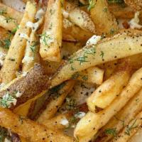 House Fries · Our crispy house fries tossed w- sea salt, fresh dill, and minced garlic
