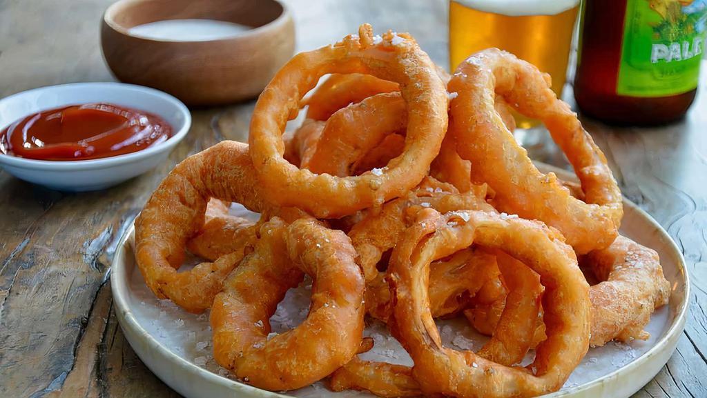 Onion Rings · House made onion rings, battered in a specialty beer.  Served with our secret Sidebar ATL sauce for dipping.