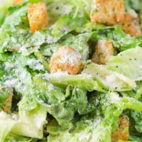 Sidebar Caesar · Served with shaved parmesan, house mad garlic croutons and house made caesar dressing.