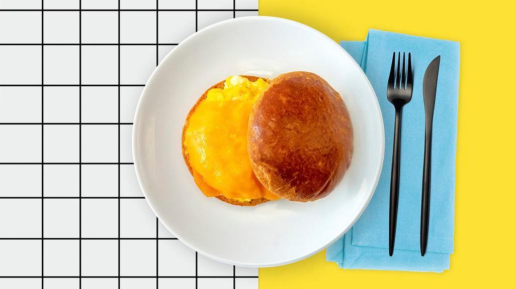 The Always Sunny · Just Egg & Cheese for the healthy LA in you. A vibey egg sandwich with 2 eggs scrambled, melty cheddar cheese on a wavy brioche bun with a smooth ketchup/mayo/sriracha sauce.