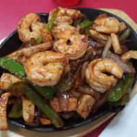 Fajita Texana · Comes with steak, shrimp, chicken, mix of vegetables, bell peppers, onions, tomatoes, accomp...