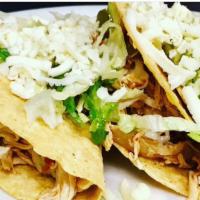Chicken Tacos · Hard shell chicken tacos with lettuce and cheese
