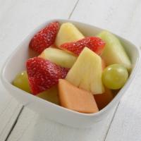 Fresh Fruit · Fresh Cut Cantaloupe, Honey Dew, Strawberries, Grapes, Pineapple and Kiwi.