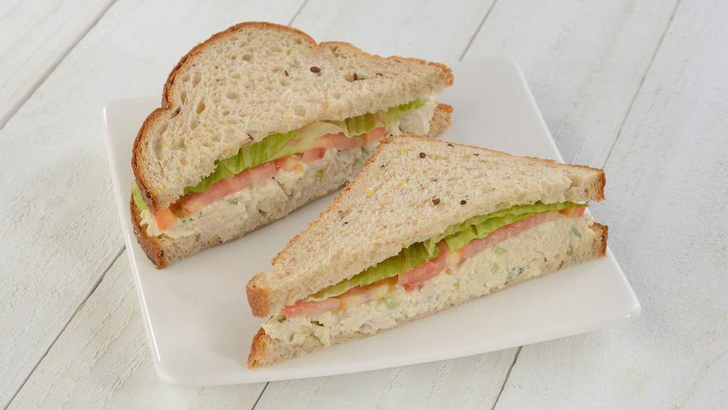 Chicken Salad Sandwich · Our famous chicken salad made with all natural chicken breast topped with lettuce and tomato.