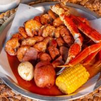 Famous Low Country Boil · half pound snow crab legs, half pound shrimp (no head), half pound all-meat sausage, one boi...