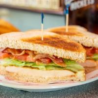 Chicken Club Sandwich · Grilled chicken breast or chicken tenders with thick-cut Applewood smoked bacon, crisp leaf ...