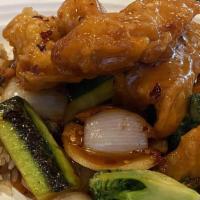 General Tso'S Chicken · Deep-fried chicken pieces coated with sweet and spicy sauce and served w. grilled vegetables
