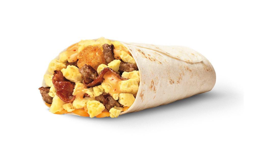 Ultimate Meat & Cheese Breakfast Burrito™ · Dressed with crispy bacon, savory sausage, golden tots, fluffy scrambled eggs, and melty cheddar cheese. Wrapped in a warm flour tortilla.