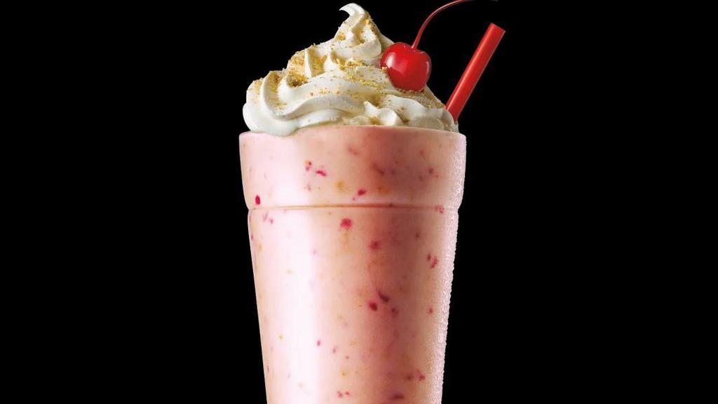 Strawberry Cheesecake Shake · Real ice cream mixed with the creamy flavor of cheesecake, graham cracker crumbs, and real strawberries. Finished with whipped topping, graham cracker crumbs and a cherry.