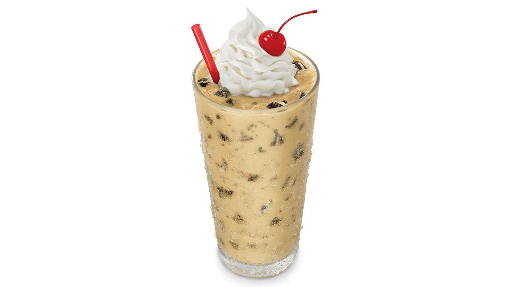 Oreo Peanut Butter Shake · Real ice cream mixed into a thick, creamy shake with rich peanut butter and Oreos®. Finished with whipped topping and a cherry.