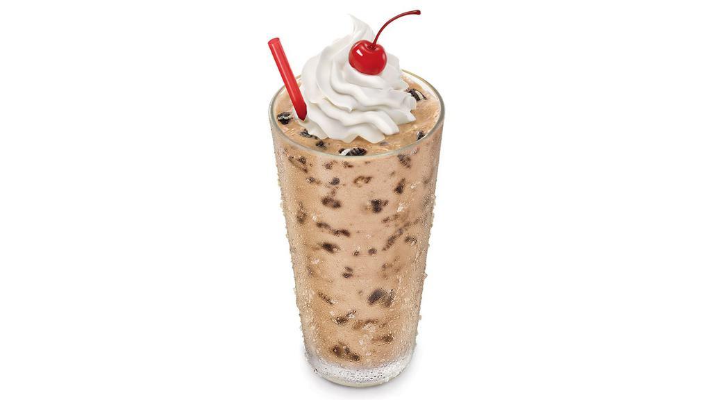Oreo Chocolate Shake · Real ice cream mixed into a thick, creamy shake with rich Oreos®. Finished with whipped topping and a cherry.