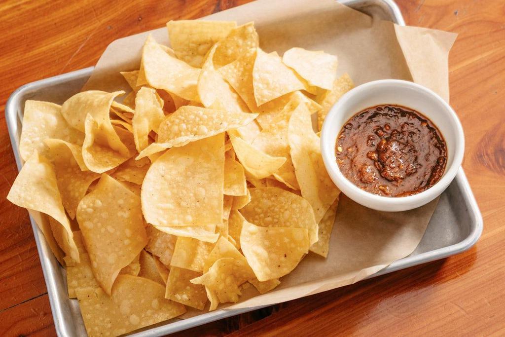 Fire Roasted Chips & Salsa · house made fire roasted salsa served warm with tortilla chips