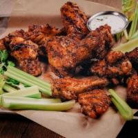 12 Wings · Your choice of wing style, wing sauce or dry rub, 1 savory dunk-able dip, and celery sticks.