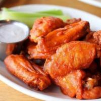 6 Wings · Your choice of wing style, wing sauce or dry rub, 1 savory dunk-able dip, and celery sticks.
