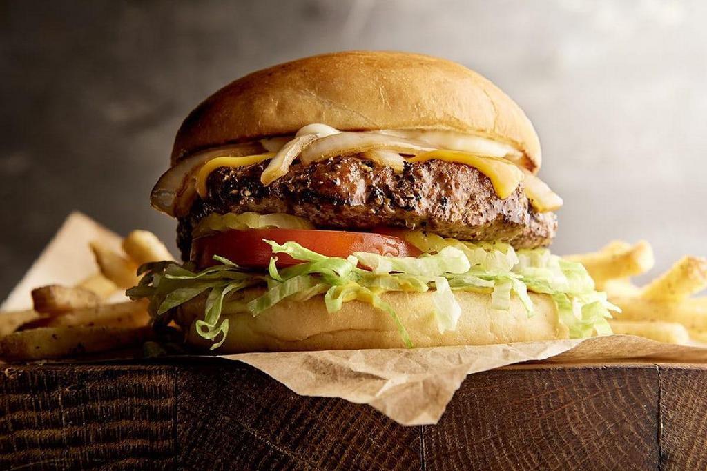 Cheeseburger · choice of cheese · lettuce · tomato · pickles · caramelized onions · mustard · mayo · served with seasoned French fries