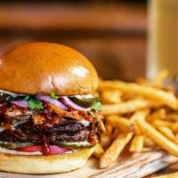 The Smokestack · in-house smoked pulled pork · cheddar · red onions · pickled jalapeños · tomato · pickles · ...