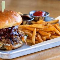 Pulled Pork · in-house smoked pulled pork · creamy coleslaw · pickles · sweet & smoky BBQ sauce · served w...