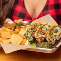 Street Tacos · three doubled up warm corn tortillas · in-house smoked brisket, chicken, pulled pork · pico ...