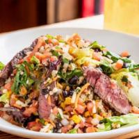 Steak Salad · grilled sirloin · mixed greens · carrots · tomatoes · pico de gallo · roasted corn · black b...