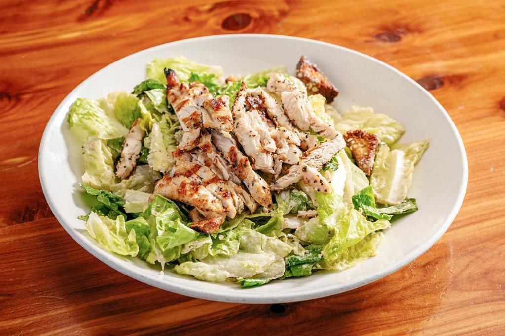 Chicken Caesar · grilled chicken · romaine lettuce · shaved Parmesan · croutons · cracked black pepper · Caesar dressing · Try it with chargrilled salmon or shrimp!
