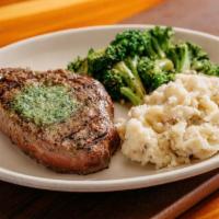 Sirloin Steak · 10 oz. grilled sirloin steak · garlic parsley butter · house made garlic mashed potatoes · s...