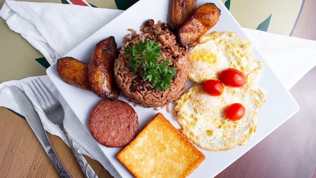Nica Breakfast (Desayuno Nica) · Two Eggs, Sausage, Gallo Pinto Rice, Fried cheese, Sweet Plantains, and Cafe con Leche.