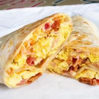 Healthy Breakfast Egg Wrap (Desayuno Wrap) · Egg whites, tomato in a tortilla wrap.