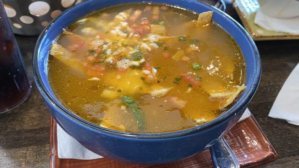 Tortilla Soup · Chicken broth base with rice, chunks of chicken breast, fried tortilla strips & pico de gallo. topped with shredded cheese.