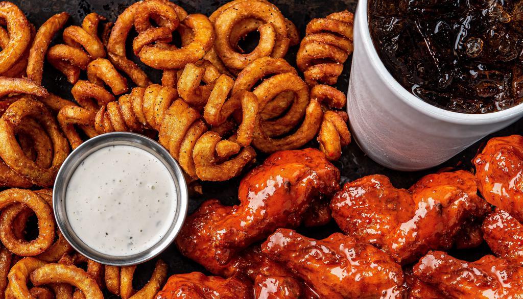 16  Smoked Bone-In Wings Combo · 16 bone-in wings smoked in-house over pecan wood then tossed with your choice of 2 flavors. Served with curly fries, a side of ranch & a drink.