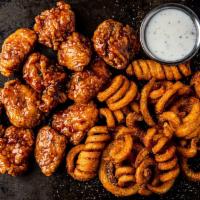 11 Boneless Wings · 11 boneless wings, served with curly fries & a side of ranch.