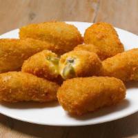 Jalapeño Cheese Bombers® · Fried spicy jalapeño bits and creamy cheddar cheese. More than just a burst of spice, it’s a...