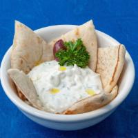 Tzatziki · Greek yogurt, fresh garlic, and cucumber.