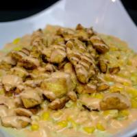 Chopped Chicken Breast Kernel Corn · Served with mozzarella cheese, special sauce, smashed potato chips, and sauces (Pink and spe...