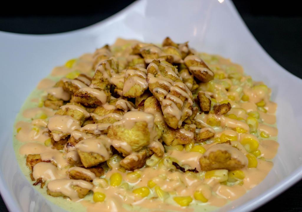 Pollo Maicito · Chopped chicken breast. Served with mozzarella cheese, special sauce, smashed potato chips and choice of sauce.