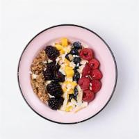 Granola Superbowl · A mega-bowl of soft greek yogurt with our out-of-this-world homemade granola with a hint of ...