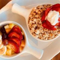 Fruit & Granola · Vanilla & Almond Granola served over two scoops of Low-Fat Yogurt with a delicious Fruit ass...