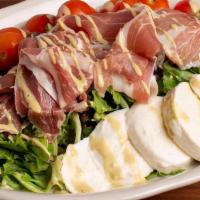 Prosciutto Salad · Mixed Greens, fresh Mozzarella, Cherry Tomatoes, Prosciutto & Italian Dressing.
