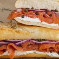 Classic Smoked Salmon Sandwich · With Cream Cheese, Onions, Capers & Lemon.
